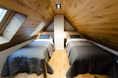 Łóżko lub łóżka w pokoju w obiekcie Apartament Dębowy
