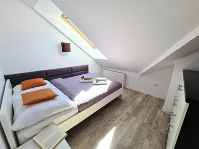 Łóżko lub łóżka w pokoju w obiekcie Lux Apartment Modern
