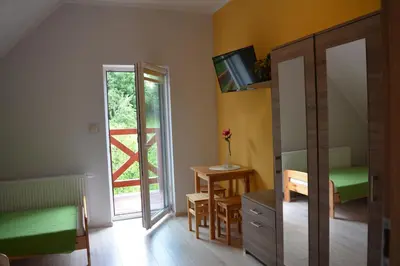 Telewizja i/lub zestaw kina domowego w obiekcie Sieraton Pokoje i Apartament