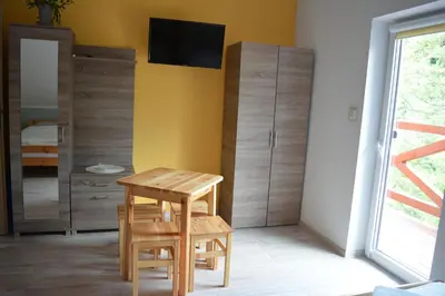 Telewizja i/lub zestaw kina domowego w obiekcie Sieraton Pokoje i Apartament