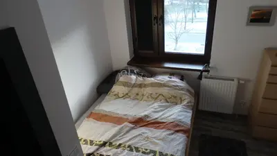 Łóżko lub łóżka w pokoju w obiekcie Walbrzych - przytulne, nowe mieszkanie