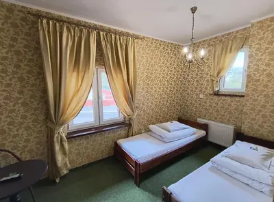 Łóżko lub łóżka w pokoju w obiekcie Green Hostel Wrocław przy ZOO
