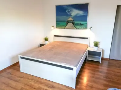 Łóżko lub łóżka w pokoju w obiekcie Apartament na Wolanach