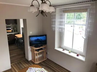 Telewizja i/lub zestaw kina domowego w obiekcie Apartament 