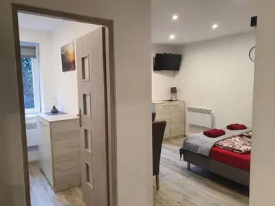 Łóżko lub łóżka w pokoju w obiekcie Apartamenty u Sikory