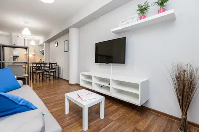 Telewizja i/lub zestaw kina domowego w obiekcie Apartamenty Gemini