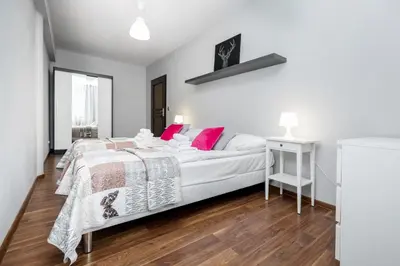 Łóżko lub łóżka w pokoju w obiekcie Apartamenty Gemini