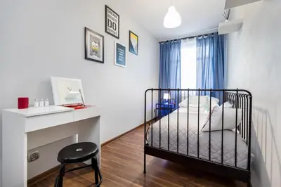 Łóżko lub łóżka w pokoju w obiekcie Apartamenty Gemini