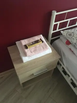 Łóżko lub łóżka w pokoju w obiekcie 