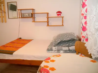 Łóżko lub łóżka w pokoju w obiekcie Pod kasztanem gospodarstwo agroturystyczne