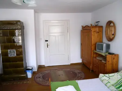 Telewizja i/lub zestaw kina domowego w obiekcie Pod kasztanem gospodarstwo agroturystyczne