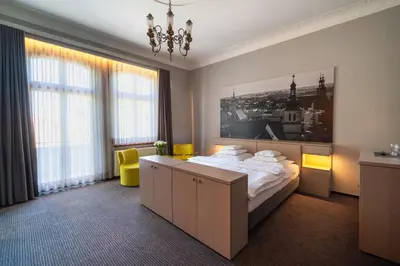 Łóżko lub łóżka w pokoju w obiekcie Hotel Salve
