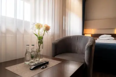 Łóżko lub łóżka w pokoju w obiekcie Hotel Salve