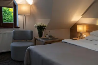 Łóżko lub łóżka w pokoju w obiekcie Hotel Salve