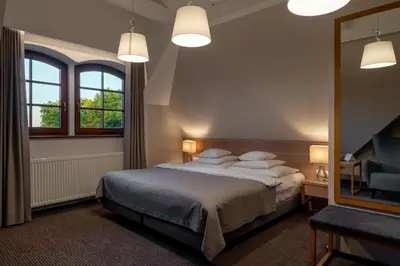 Łóżko lub łóżka w pokoju w obiekcie Hotel Salve