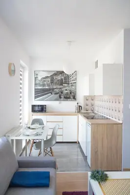 Kuchnia lub aneks kuchenny w obiekcie A.S. HOME Kościuszki Apartament dwupoziomowy
