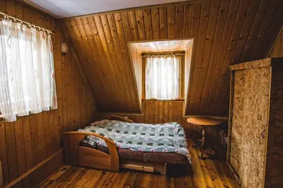 Łóżko lub łóżka w pokoju w obiekcie Janowa Chata