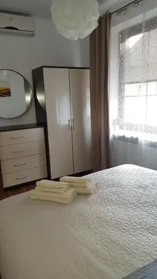 Łóżko lub łóżka w pokoju w obiekcie Na Rynku
