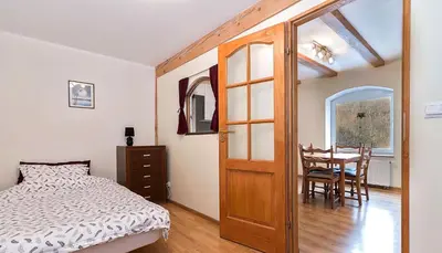 Łóżko lub łóżka w pokoju w obiekcie Villa Oranje