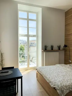 Łóżko lub łóżka w pokoju w obiekcie Absynt Hostel Wrocław