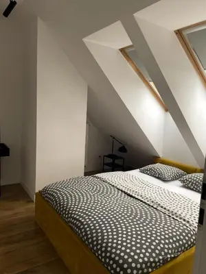 Łóżko lub łóżka w pokoju w obiekcie Absynt Hostel Wrocław