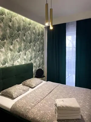Łóżko lub łóżka w pokoju w obiekcie Absynt Hostel Wrocław