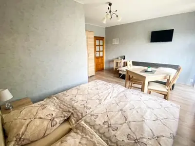 Telewizja i/lub zestaw kina domowego w obiekcie Pokoje gościnne Anna