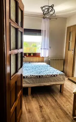 Łóżko lub łóżka w pokoju w obiekcie Pokoje gościnne Anna