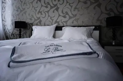 Łóżko lub łóżka w pokoju w obiekcie Villa Romeo