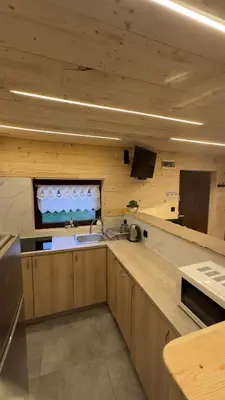 Kuchnia lub aneks kuchenny w obiekcie Domek Adusiówka