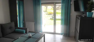 Telewizja i/lub zestaw kina domowego w obiekcie Aura