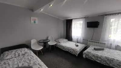 Łóżko lub łóżka w pokoju w obiekcie Zajazd pod Lwem