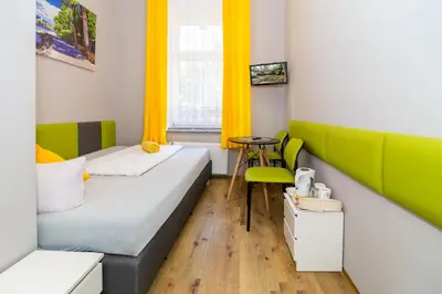 Łóżko lub łóżka w pokoju w obiekcie Willa Diament