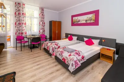 Łóżko lub łóżka w pokoju w obiekcie Willa Diament