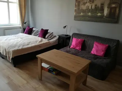 Łóżko lub łóżka w pokoju w obiekcie Novitas Apartments
