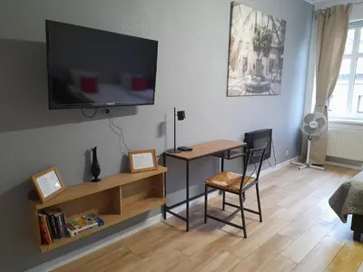 Telewizja i/lub zestaw kina domowego w obiekcie Novitas Apartments