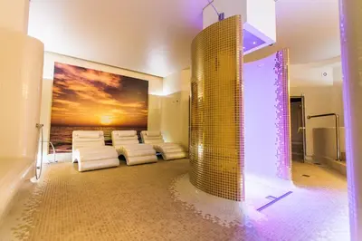 Łóżko lub łóżka w pokoju w obiekcie Hotel Court Wellness&Spa