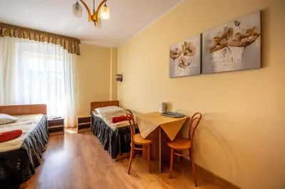 Łóżko lub łóżka w pokoju w obiekcie Dom Wypoczynkowy Rybniczanka-Wanda Lądek-Zdrój w górach