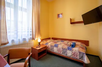 Łóżko lub łóżka w pokoju w obiekcie Dom Wypoczynkowy Rybniczanka-Wanda Lądek-Zdrój w górach
