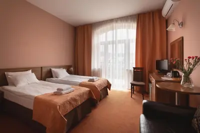Łóżko lub łóżka w pokoju w obiekcie Paria Hotel
