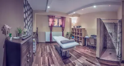 Łóżko lub łóżka w pokoju w obiekcie Hotel Niemcza Wino & Spa