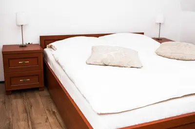Łóżko lub łóżka w pokoju w obiekcie Pałac Krobielowice