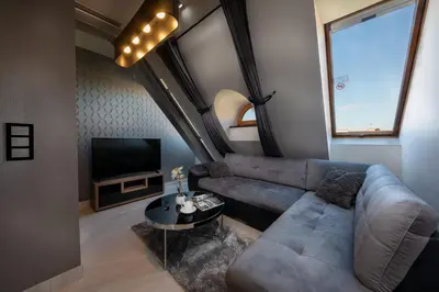 Telewizja i/lub zestaw kina domowego w obiekcie Aparthotel New Lux