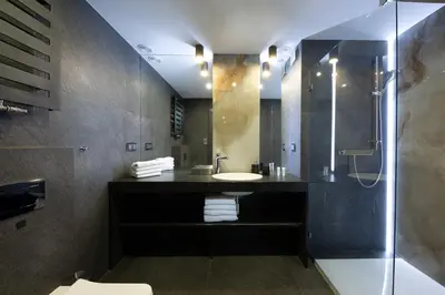 Łazienka w obiekcie Aparthotel New Lux
