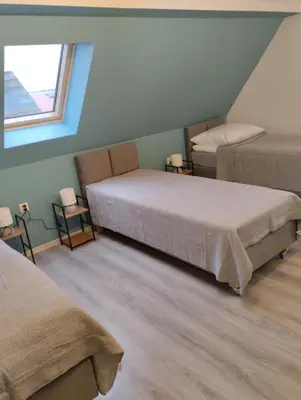 Łóżko lub łóżka w pokoju w obiekcie Agroturystyka u Pawła i Asi