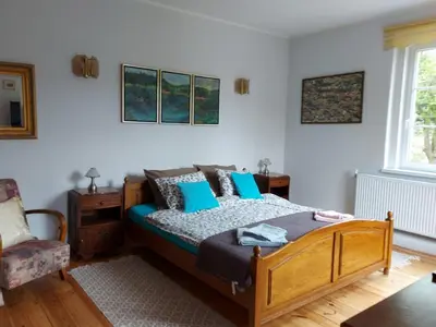 Łóżko lub łóżka w pokoju w obiekcie Apartament na Rybnej