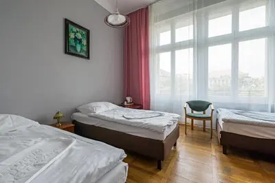 Łóżko lub łóżka w pokoju w obiekcie Savoy Wrocław