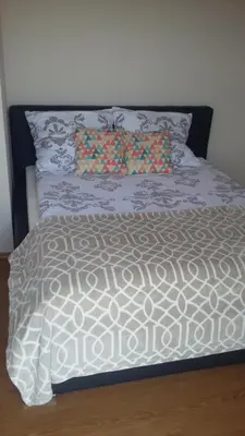 Łóżko lub łóżka w pokoju w obiekcie APARTAMENT NA DOBY - LUBIN