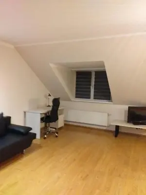 Telewizja i/lub zestaw kina domowego w obiekcie APARTAMENT NA DOBY - LUBIN