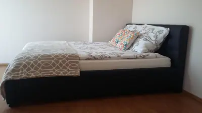 Łóżko lub łóżka w pokoju w obiekcie APARTAMENT NA DOBY - LUBIN
